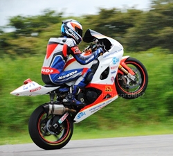 Ben Fortt pulls a wheelie at the Nakorn Chaise Thailand Circuit.